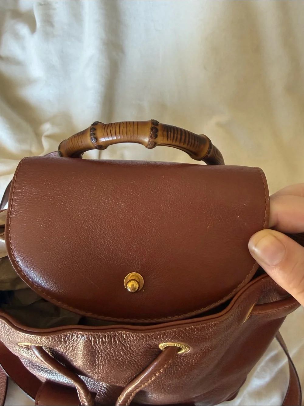GUCCI leather backpack with gold and bamboo handle
